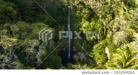 La Fortuna Waterfall in Costa Rica. The waterfall is located on the Arenal River at the base of the dormant Chato volcano. Long exposure. La Fortuna Waterfall in Costa Rica. The waterfall is located on the Arenal River at the base of the dormant Chato volcano. Long exposure. 103204263