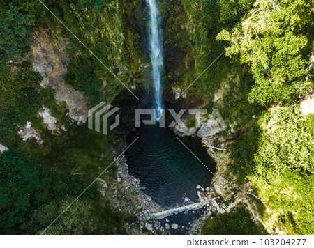 La Fortuna Waterfall in Costa Rica. The waterfall is located on the Arenal River at the base of the dormant Chato volcano. Long exposure. La Fortuna Waterfall in Costa Rica. The waterfall is located on the Arenal River at the base of the dormant Chato volcano. Long exposure. 103204277