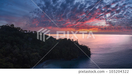 Beautiful sunset from the top of Cerro Pelado in Costa Rica. Sunset over the Manuel Antonio beach, Costa Rica. Beautiful sunset from the top of Cerro Pelado in Costa Rica. Sunset over the Manuel Antonio beach, Costa Rica. 103204322