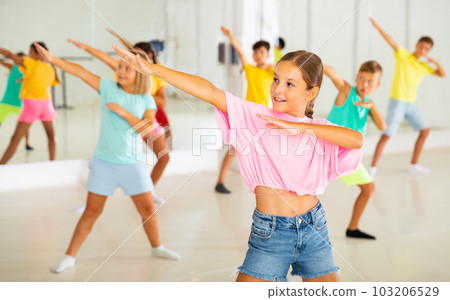 Dance class for kids, girls and boys training in dance studio 103206529