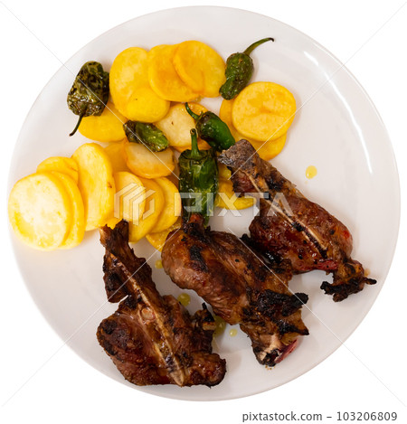 Grilled pork shoulde with baked potato and jalapeno peppers 103206809