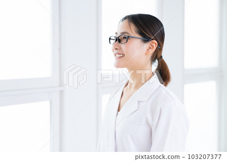 A lady in white A lady in white 103207377