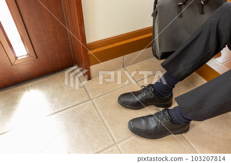 man's legs in a suit 103207814