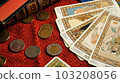 Tarot cards, coins and books 103208056
