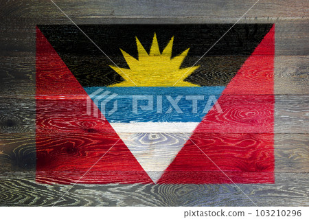 Antigua and Barbuda flag on rustic old wood surface background Antigua and Barbuda flag on rustic old wood surface background 103210296