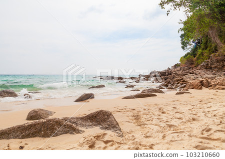 Beautiful Surin beach in Choeng Thale city, Phuket, Thailand with white sand, turquoise water and palm trees Beautiful Surin beach in Choeng Thale city, Phuket, Thailand with white sand, turquoise water and palm trees 103210660