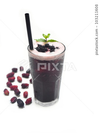 Mulberry ice tea on a white background closeup Mulberry ice tea on a white background closeup 103211608