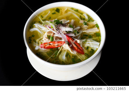 Chicken soup in vietnamese style on black background Chicken soup in vietnamese style on black background 103211665