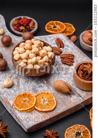 Mix of roasted macadamia nuts, cashews, pecans, almonds, raisins and dry berries Mix of roasted macadamia nuts, cashews, pecans, almonds, raisins and dry berries 103212983