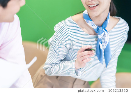 A man approaching a woman in the office and a woman stepping back, faceless A man approaching a woman in the office and a woman stepping back, faceless 103213230