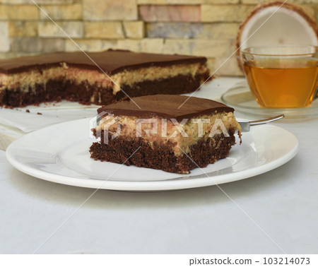 Bounty Cake made of fresh coconut on a table 103214073