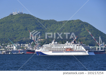 Photographing the scenery of the cruise ship Hanseatic Nature that calls at Hakodate Port in Hakodate City, Hokkaido in early summer Photographing the scenery of the cruise ship Hanseatic Nature that calls at Hakodate Port in Hakodate City, Hokkaido in early summer 103217254