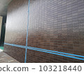 Joint sealing after clear painting of the entrance exterior wall tile wall replacement work by post-casting method, under construction 103218440