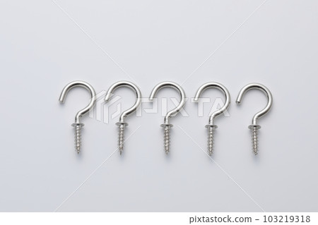 A screw with a hook photographed against a white background 103219318