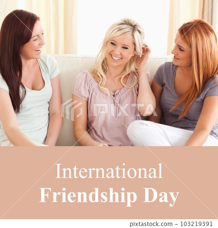 Composition of happy friendship day text over happy caucasian female friends talking 103219391