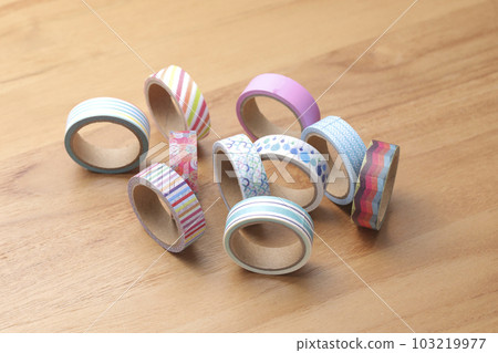 Masking tape taken on a wooden table Masking tape taken on a wooden table 103219977