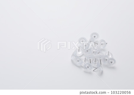 Thumbtacks photographed on a white background 103220056
