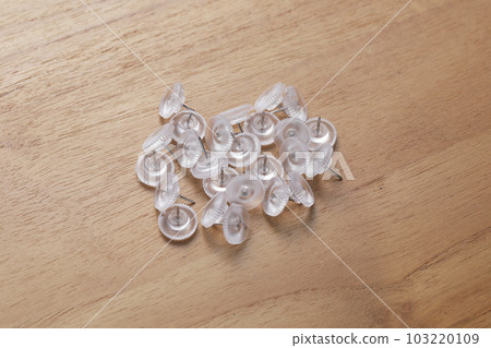 Thumbtacks photographed on the table 103220109