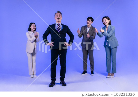 Asian Korean senior, middle aged and young male and female colleagues models in business attire, neon purple studio background, be congratulated 103221320