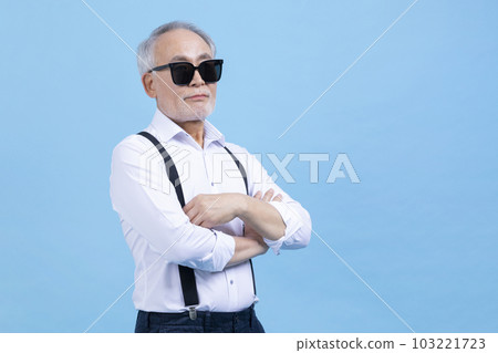 active young senior Korean Asian male wearing sunglasses 103221723