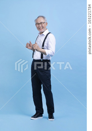 happy active young senior Korean Asian woman standing 103221784