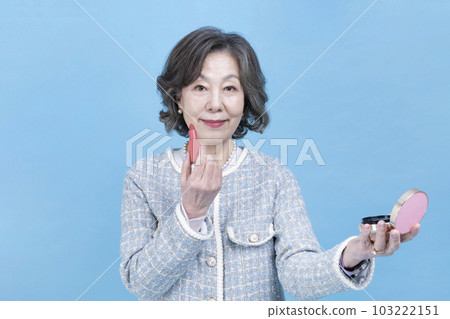 active young senior Korean Asian woman wearing lipstick active young senior Korean Asian woman wearing lipstick 103222151