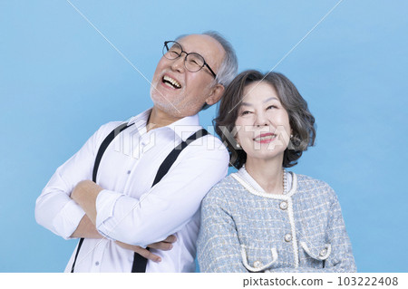 active young senior Korean Asian couple standing back to back active young senior Korean Asian couple standing back to back 103222408