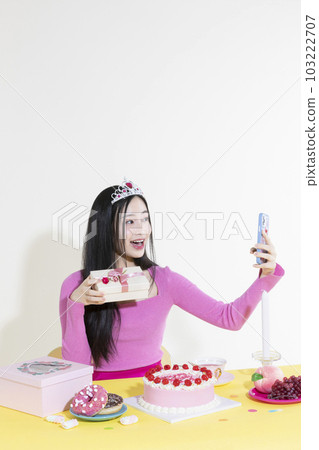 vintage y2k pink retro concept photo of korean asian cute woman in birthday party concept 103222707
