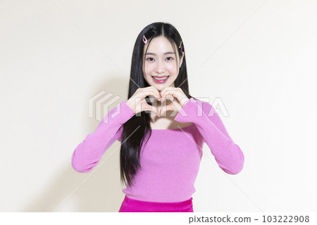 vintage y2k pink retro concept photo of korean asian cute woman with hand motion 103222908
