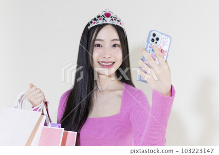 vintage y2k pink retro concept photo of korean asian cute woman in birthday party concept 103223147