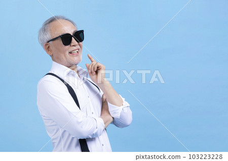 active young senior Korean Asian male wearing sunglasses 103223228