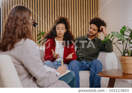 couple of man and woman at psychologist, taking care of mental health in relationship. couple of man and woman at psychologist, taking care of mental health in relationship. 103223603