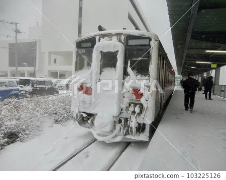 train running in snow country 103225126