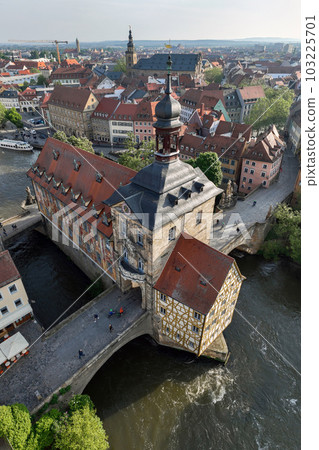 Bamberg Altes Rathaus. Aerial view of the Old town of Bamberg with the Historic Town Hall on the Regnitz river, morning 103225701