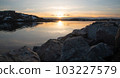 Fabulous sunset over the rocky shore of the North Sea in Norway 103227579