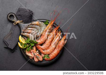 Fresh seafood. Board with langoustines Fresh seafood. Board with langoustines 103229506