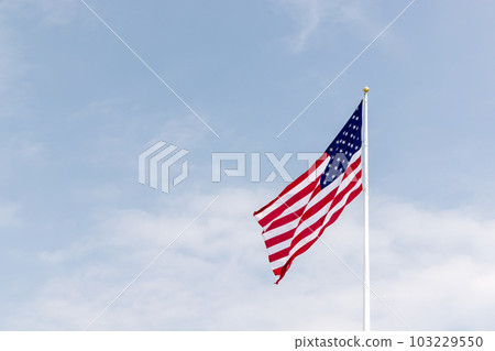 A photo of American flag against the sky A photo of American flag against the sky 103229550