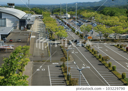 Spacious airport parking lot 103229790