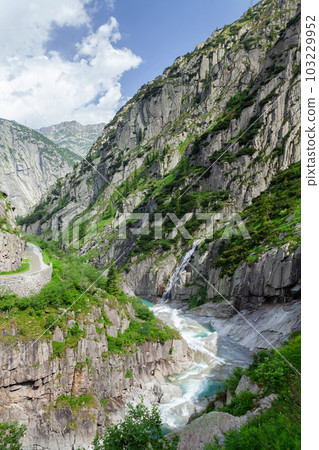 Landscape with mountains, blooming meadows, forest and a river Landscape with mountains, blooming meadows, forest and a river 103229952