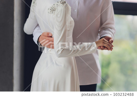 National wedding. Bride and groom. Wedding muslim couple during the marriage ceremony. Muslim marriage. National wedding. Bride and groom. Wedding muslim couple during the marriage ceremony. Muslim marriage. 103232488