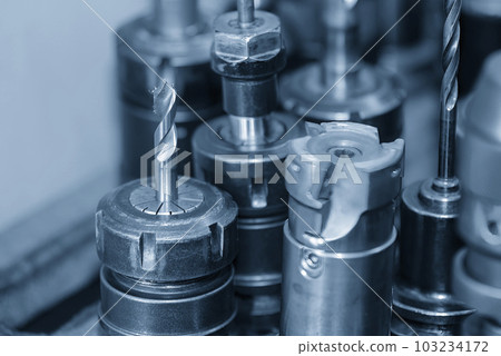 The group of various size of drill tools in the holder with light blue scene. The group of various size of drill tools in the holder with light blue scene. 103234172