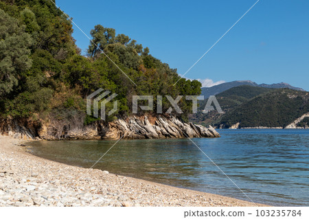 Pebble beach with blue sea, Lefkada island, Greece 103235784