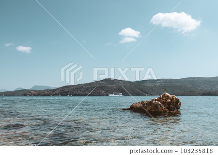 Big rock in blue Ionian sea view on Lefkada Greece Big rock in blue Ionian sea view on Lefkada Greece 103235818