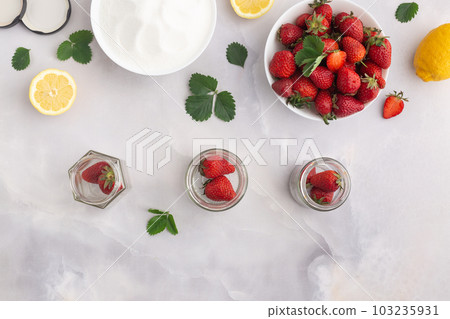 Jam strawberries preparation process. Season canning berries and cooking homemade jam concept 103235931