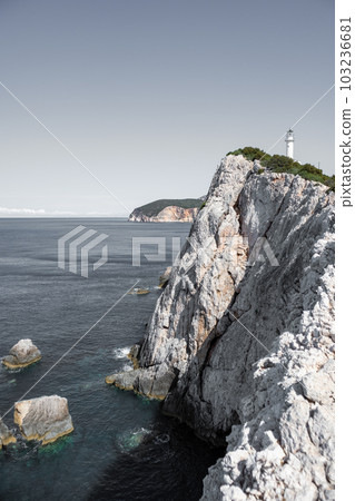Lefkada island sea coast lighthouse on rocky cliff 103236681