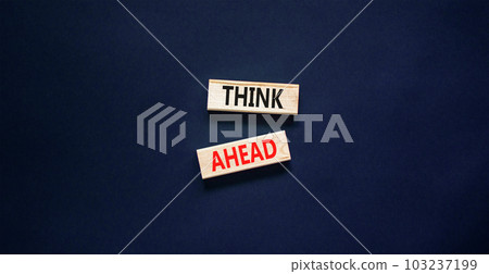 Think ahead symbol. Concept words Think ahead on wooden blocks on a beautiful black table black background. Business, support, motivation, psychological and think ahead concept. Copy space. Think ahead symbol. Concept words Think ahead on wooden blocks on a beautiful black table black background. Business, support, motivation, psychological and think ahead concept. Copy space. 103237199