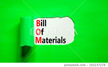 BOM bill of materials symbol. Concept words BOM bill of materials on beautiful white paper. Beautiful green table green background. Business and BOM bill of materials concept. Copy space. 103237278