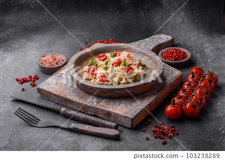 Delicious boiled rice with peppers, peas, asparagus beans and carrots Delicious boiled rice with peppers, peas, asparagus beans and carrots 103238289