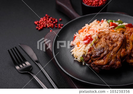 Delicious boiled rice with peppers, peas, asparagus beans and carrots and fried chicken 103238356