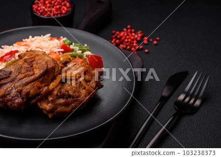Delicious boiled rice with peppers, peas, asparagus beans and carrots and fried chicken Delicious boiled rice with peppers, peas, asparagus beans and carrots and fried chicken 103238373